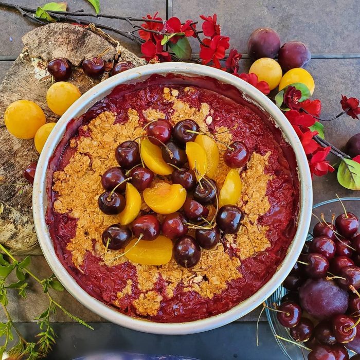 Plum Cobbler topped with Peach & Cherry Slices